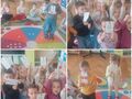 dzieci pokazują karty z cyframi