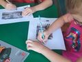 Dzieci rysują ilustracje upamiętniające Powstanie Wielkopolskie